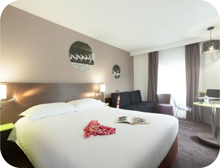 Chambre confortable à l'hôtel Ibis Styles de Beaune, idéale pour un séjour relaxant