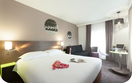 Chambre confortable à l'hôtel Ibis Styles de Beaune, idéale pour un séjour relaxant